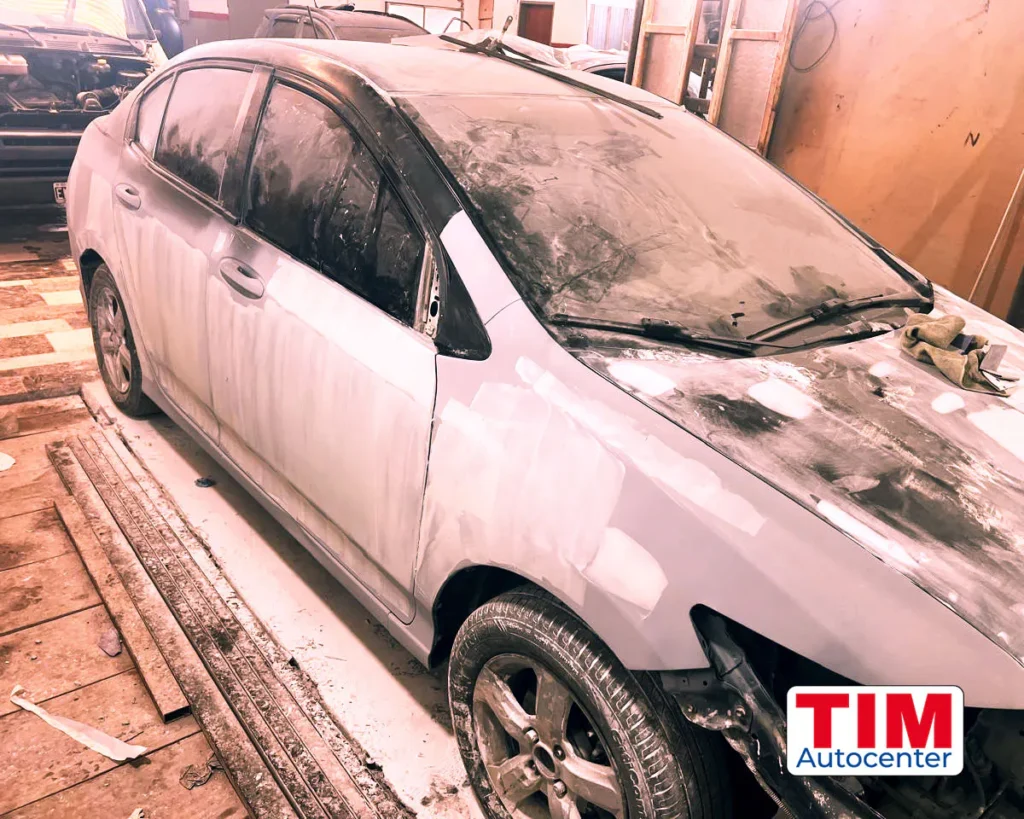 Chevrolet Corsa Gris – chapa y pintura